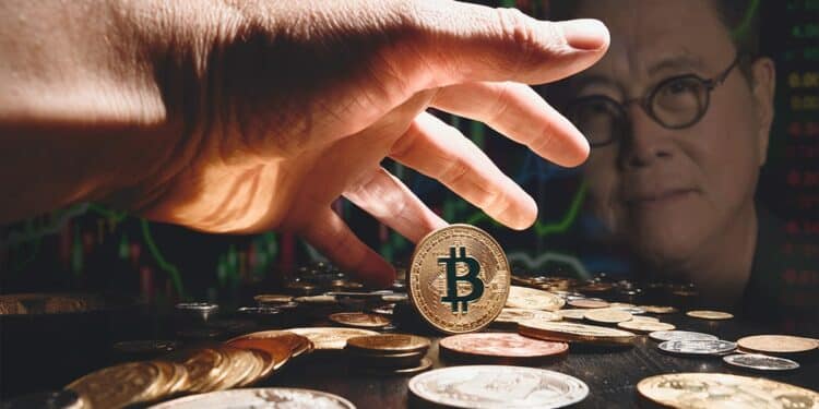 mano aproximandose a agarrar moneda de bitcoin sobre mesa con robert kiyosaki y gráfico de mercado en el fondo