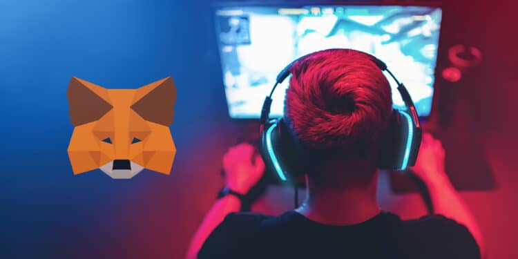 Gamer en la computadora junto a logo de Metamask.