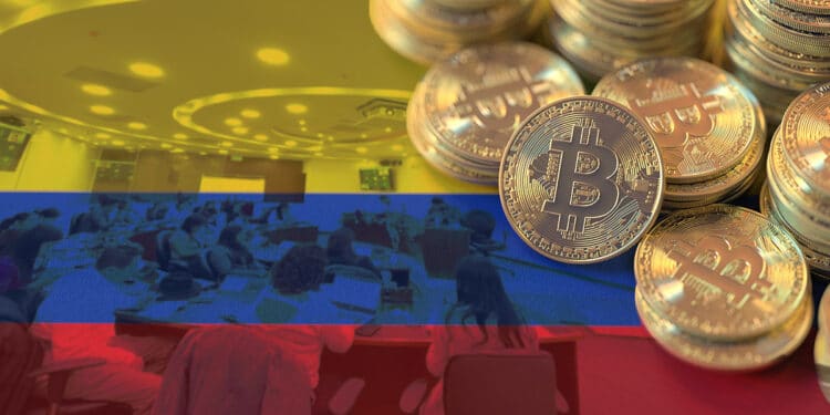 monedas de bitcoin apiladas sobre bandera de colombia con camara de diputados en el fondo