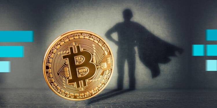 moneda de bitcoin proyectando sobre ade superheroe con logos de FTX en el fondo