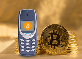 Celular sin internet junto a bitcoin.