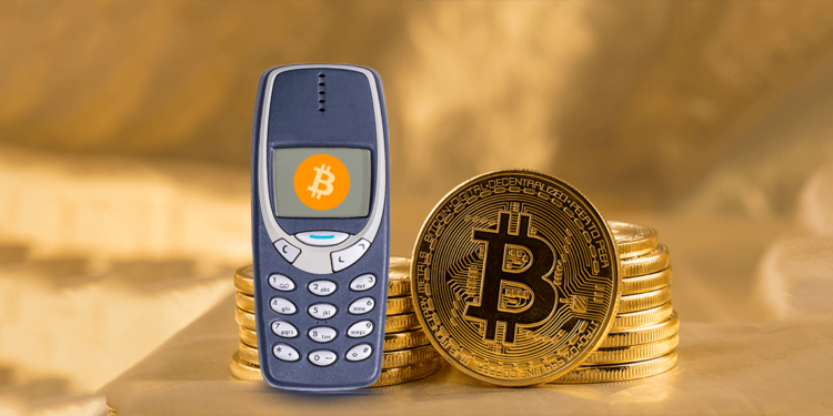 Celular sin internet junto a bitcoin.