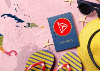 pasaporte con logo de tron junto a mapa del caribe.