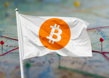 Bandera de bitcoin junto a ciudadelas.