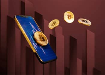 Teléfono con gráficos y BTC saliendo expulsados y fondo de barras