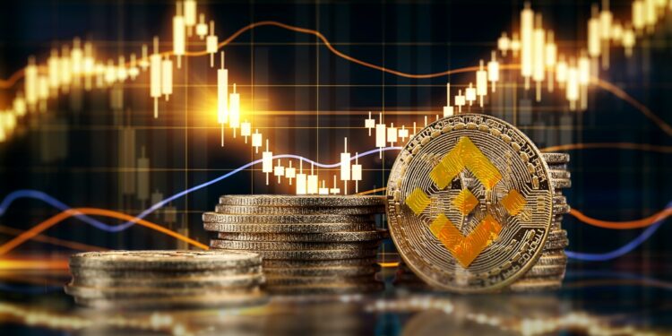 monedas apiladas del token BNB, de Binance, con gráfico de precio en el fondo
