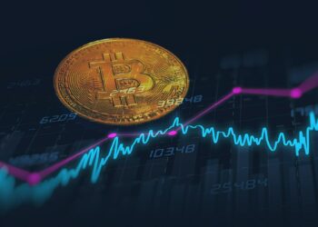 moneda de bitcoi sobre bráfico de precio