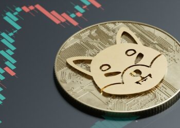 Moneda de Shiba inu sobre superficie con gráfico de precio en alza