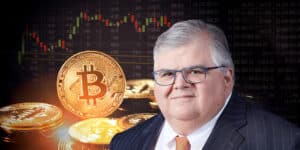 Jefe de BIS junto a bitcoin.