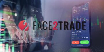 Teléfono celular con grafico de precios en pantalla y logo de Face2Trade al frente.