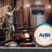 Tribunal con logo de AirBit Club.