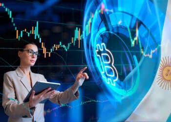 Bandera de Argentina y bitcoin.