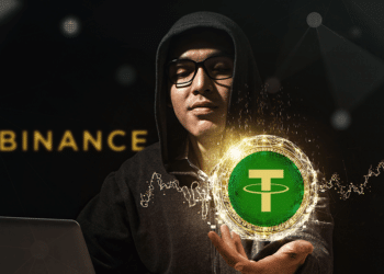 Venezolano con usdt y logo de binance detrás.