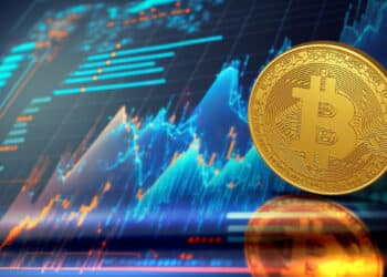 moneda de bitcoin sobre superficie de cristal con graficos de precio alcista en el fondo