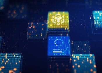 bloques digitales con logo de BNB chain y mensaje de actualización cargando