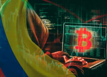 Bandera de Colombia y hacker de criptomonedas.