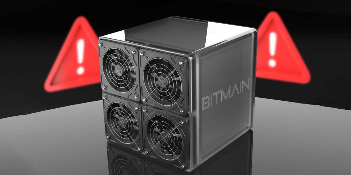 Minero de bitmain junto a símbolo de alerta, error.