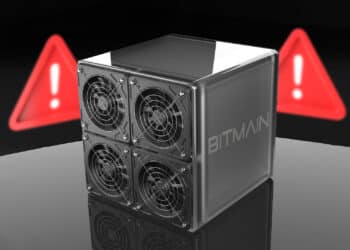 Minero de bitmain junto a símbolo de alerta, error.