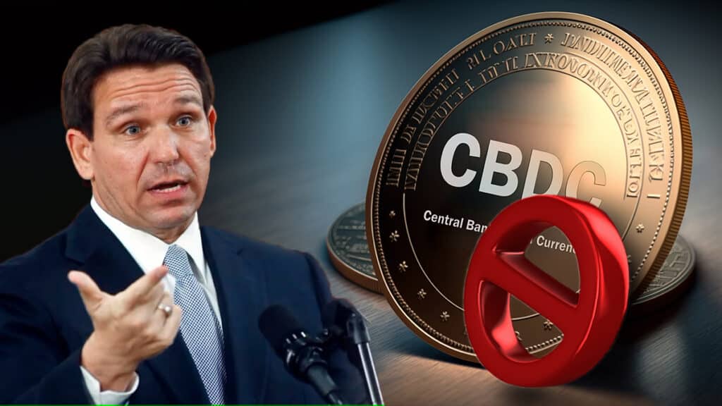 Ron DeSantis junto a moneda de CBDC con simbolo de prohibición