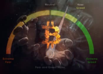 logo de bitcoin entre manos con grafico de codicia superpuesto