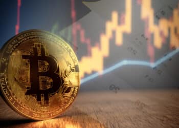 moneda de bitcoin con graficos de precio y calendarios en el fondo