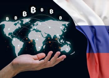 Bandera de Rusia junto a transacciones internacionales de bitcoin.