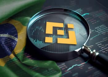 Lupa con exchange Binance y bandera de Brasil.