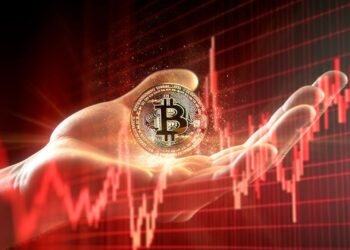 Bitcoin y gráfico rojo.