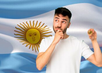 Argentino, bitcoin y bandera de Argentina.