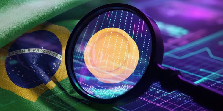 Real digital debajo de una lupa y la bandera de Brasil.