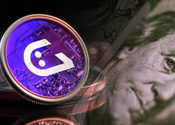 stablecoin GHO de Aave junto a billete de dólar