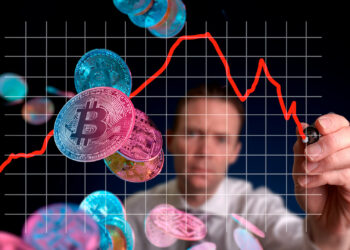 Bitcoin y gráfico en bajada.