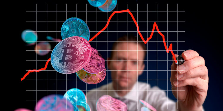 Bitcoin y gráfico en bajada.