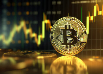 moneda de bitcoin con grafico de precio alcista en el fondo