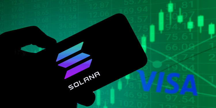 Criptomoneda Solana y logo de VISA.