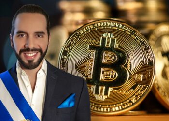 Nayib bukele junto a monedas de bitcoin apiladas