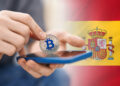 Bitcoin y bandera de España.