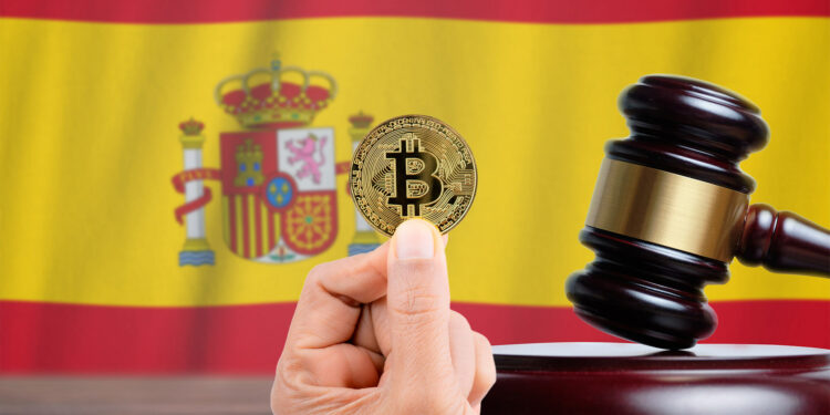 Bitcoin y bandera de España.