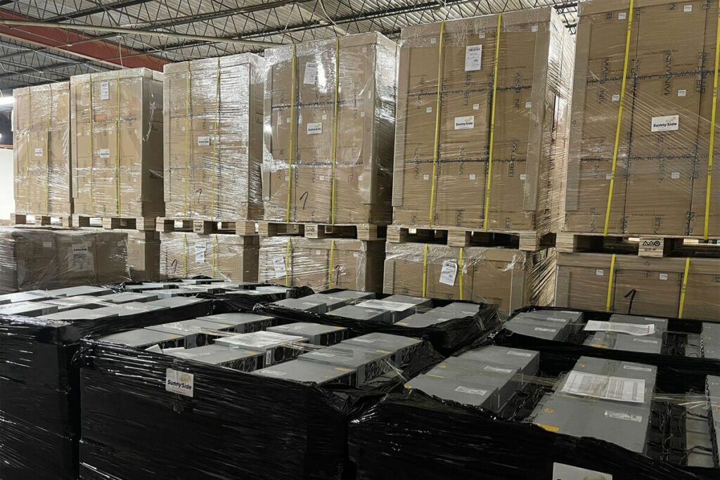 Bitcoin mining machines in Colorado warehouse awaiting overseas shipping