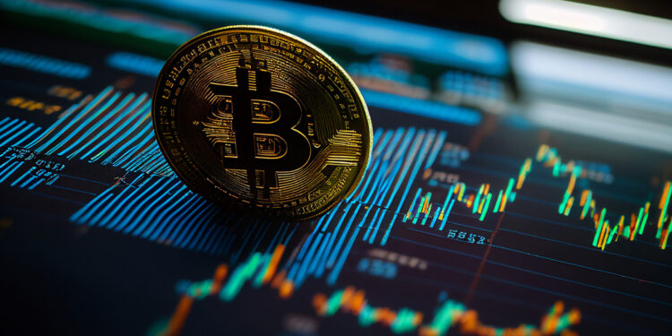 moneda de bitcoin sobre pantalla mostrando graficos de precio y volatilidad
