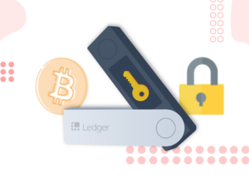 Un hardware wallet de Ledger junto a una moneda de bitcoin y un candado de seguridad