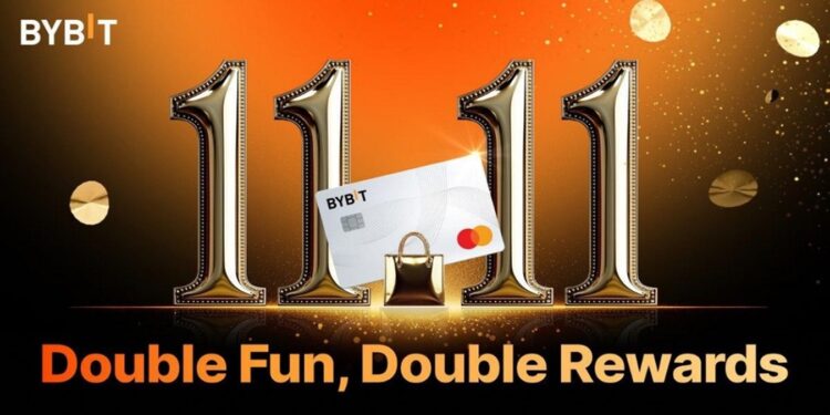 los números 11 y 11 en color plata y una tarjeta de debito de MasterCard de ByBit.