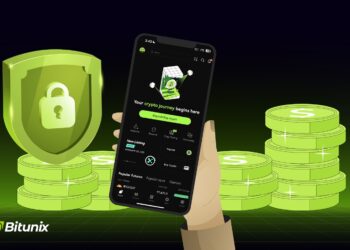 Teléfono con la aplicación de Bitunix y monedas verdes de fondo.