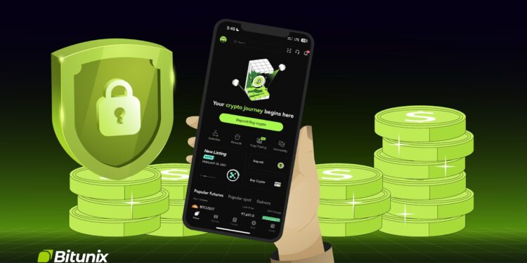 Teléfono con la aplicación de Bitunix y monedas verdes de fondo.