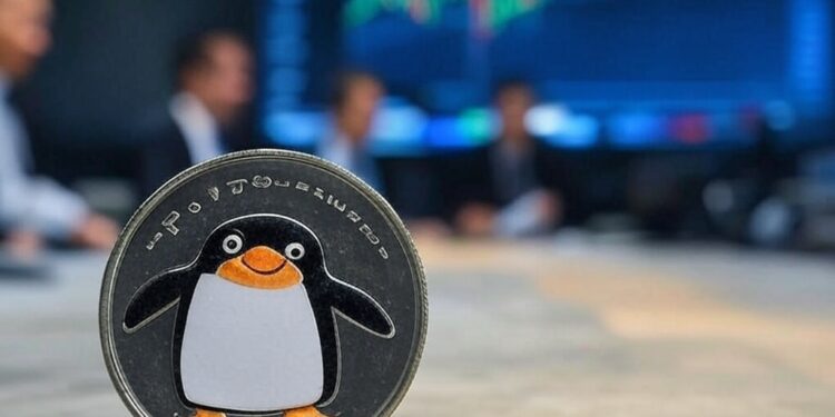 moneda de pengu sobre una mesa.