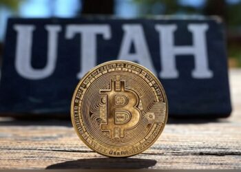 Una imagen de bitcoin con un letrero que dice Utah en el fondo.