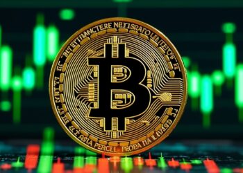 Imagen de gráficos de precio de bitcoin en color verde y una moneda de BTC