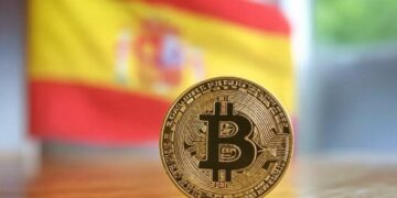 Imagen generada por la IA Grok en la que se muestra una moneda dorada de bitcoin y la bandera de España.