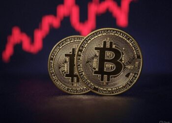 monedas de bitcoin con gráfico de fondo.