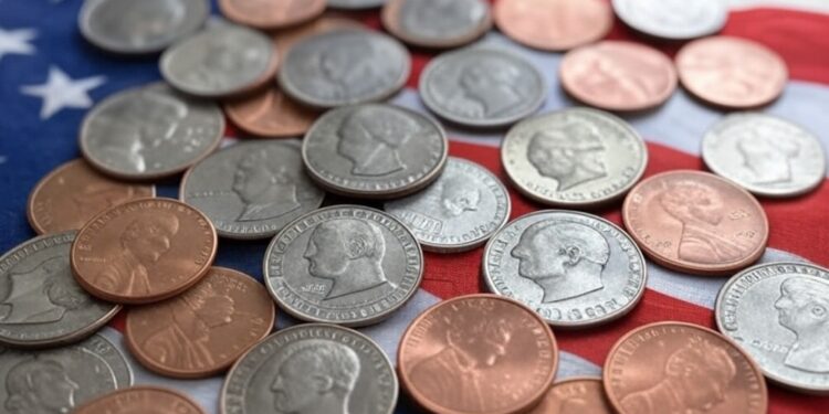 Imagen generada por la IA Grok de monedas sobre una bandera de EE. UU.